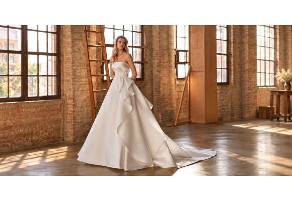 El escote palabra de honor en vestidos de novia, corsets, cortes, tejidos y formas de llevarlo